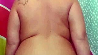 suzie milf strips to reveal big boobs