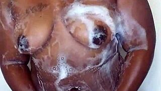 Ebony bath time turns into wet fingering and massage fetish
