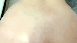 She helps him finish quickly in the bathroom