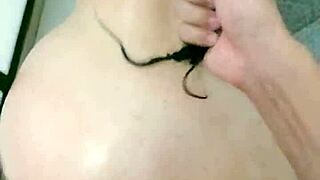 She helps him finish quickly in the bathroom