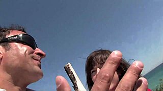 A hot wife receives a handjob from a randy man