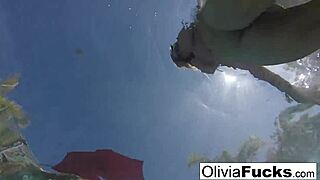 Olivia enjoys some relaxing summer fun in the pool.