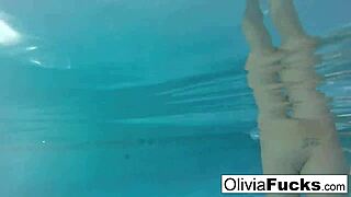 Olivia enjoys some relaxing summer fun in the pool.