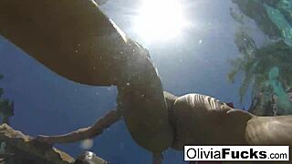 Olivia enjoys some relaxing summer fun in the pool.