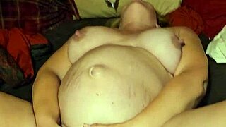 Big tits mature woman pleasuring herself to orgasm