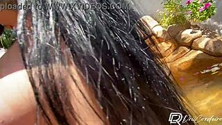 Tattooed brunette rides boyfriend in jacuzzi, gets facial cumshot.