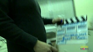 Dark haired milf rides dick on sofa