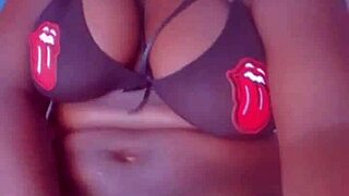 Mature ebony woman feels intense pleasure masturbating in lingerie