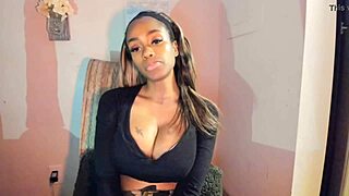 tattooed ebony milf teases with her big tits