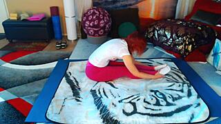 Daily hip mobility stretching for freedom with barefoot redhead milf in yoga session.