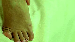 Milf dominatrix plays with toys and fingers in session