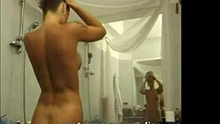 Bathroom play in free mature porn video