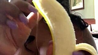 Banana getting a deepthroat from an African American mature woman