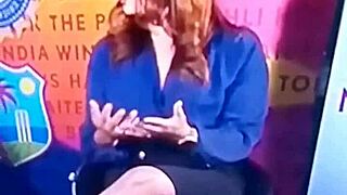 spicy indian tv anchor hosting cricket show with flair
