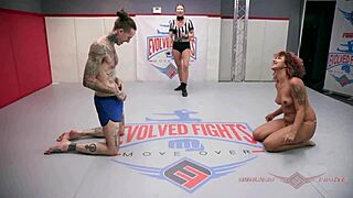 Daisy Ducati and Ruckus engage in hardcore wrestling
