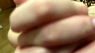 Young wife gives her husband a sexy oiled massage