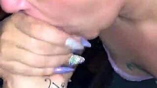 Deep throat in a porn video with a black BBC and a mature blonde