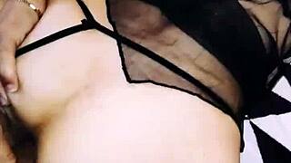 A wife in an erotic fishnet bodysuit beautifully spreads her legs