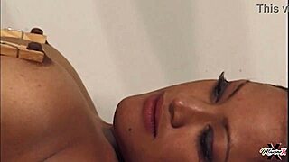 Asian cutie gets wet while playing with her pussy