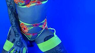 Petite MILF Joanna Angel in neon lingerie and stockings