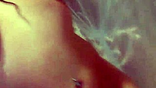 Horny milf with big tits uses toys in shower for intense blowjob action.