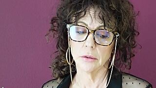 Beautiful curly-haired amateur MILF in solo action
