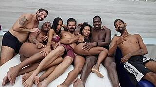 Hot wives Yasmin and Afrodite in wild Brazilian orgy scene