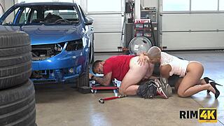 Big-boobed blonde gets rim job in car shop