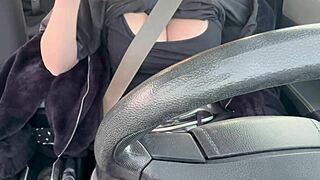 Italian MILF flashing her big tits while driving? Watch her tease in public!