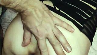 A couple enjoys leisurely sex with a beautiful milf in lingerie and stockings