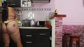 The cook is being fucked by his stepmother in the kitchen