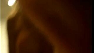 A busty trans girl plays with her cock and reaches orgasm