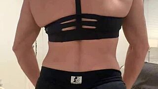 athletic milf wife flexes muscles in homemade solo