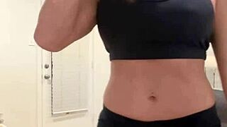 athletic milf wife flexes muscles in homemade solo