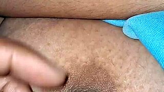 Desi girl flaunts big boobs with nipple close-up action.