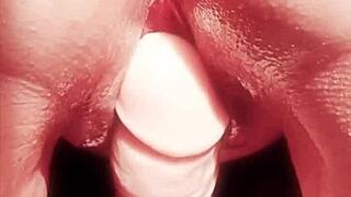 mature woman teases her big wet cunt close up.