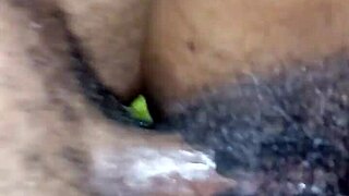 Feeling the intense pleasure as her oily wet pussy gets oiled and orgasms
