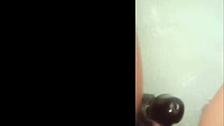 Latina milf plays with shaved pussy using nice dildo