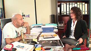 Mature woman gets interviewed for job in office setting