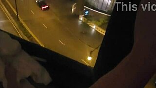 Petite babe masturbates in public by hotel window for thrill
