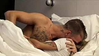 Divine Sinners blonde tattooed milf gets slow oily massage. Kissing and pussy licking with inked Damon heat up the scene!