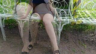 Wife in high heels at park
