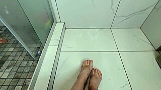 Sexy young milf teases cock with barefoot feet and toes in shower close up pov fucking