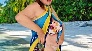 Wow! Granny with Huge Tits Stuns with a Sexy Stripdance on the Beach!