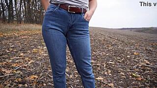 Milf teasing her big cameltoe in tight blue jeans while outdoors is pure fire.