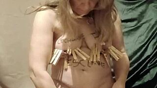 french slave endures self-spanking with clamps and candles