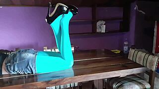 milf with gorgeous legs in pantyhose and heels lounging on the desk