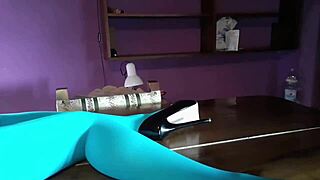 milf with gorgeous legs in pantyhose and heels lounging on the desk