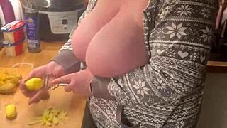 Chubby milf in lingerie gives handjob in the kitchen with her big natural tits