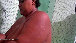 Did you see this? Hidden camera caught my naughty chubby stepmom bathing!